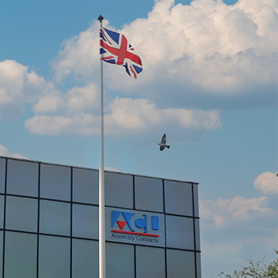 ACL factory with flag flying